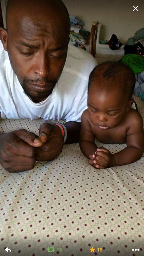 father and child praying